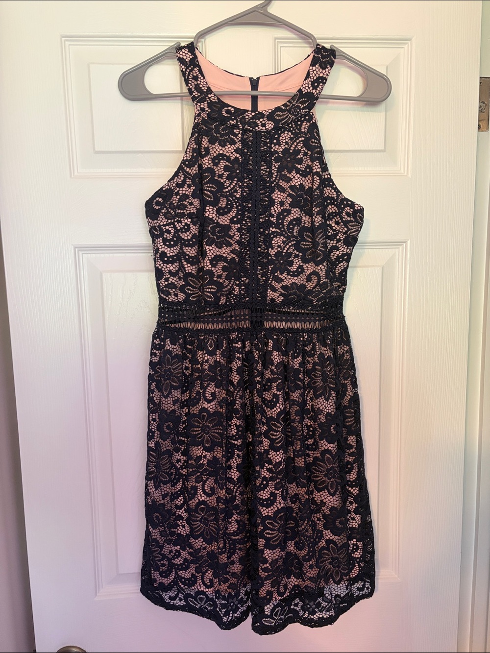 Navy lace cocktail dress with pale pink lining